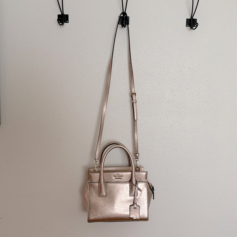 Kate spade rose gold purse.